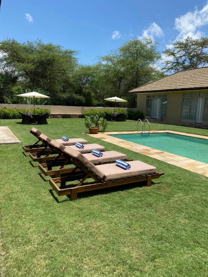 Отель The Safari House Usa River Экстерьер фото